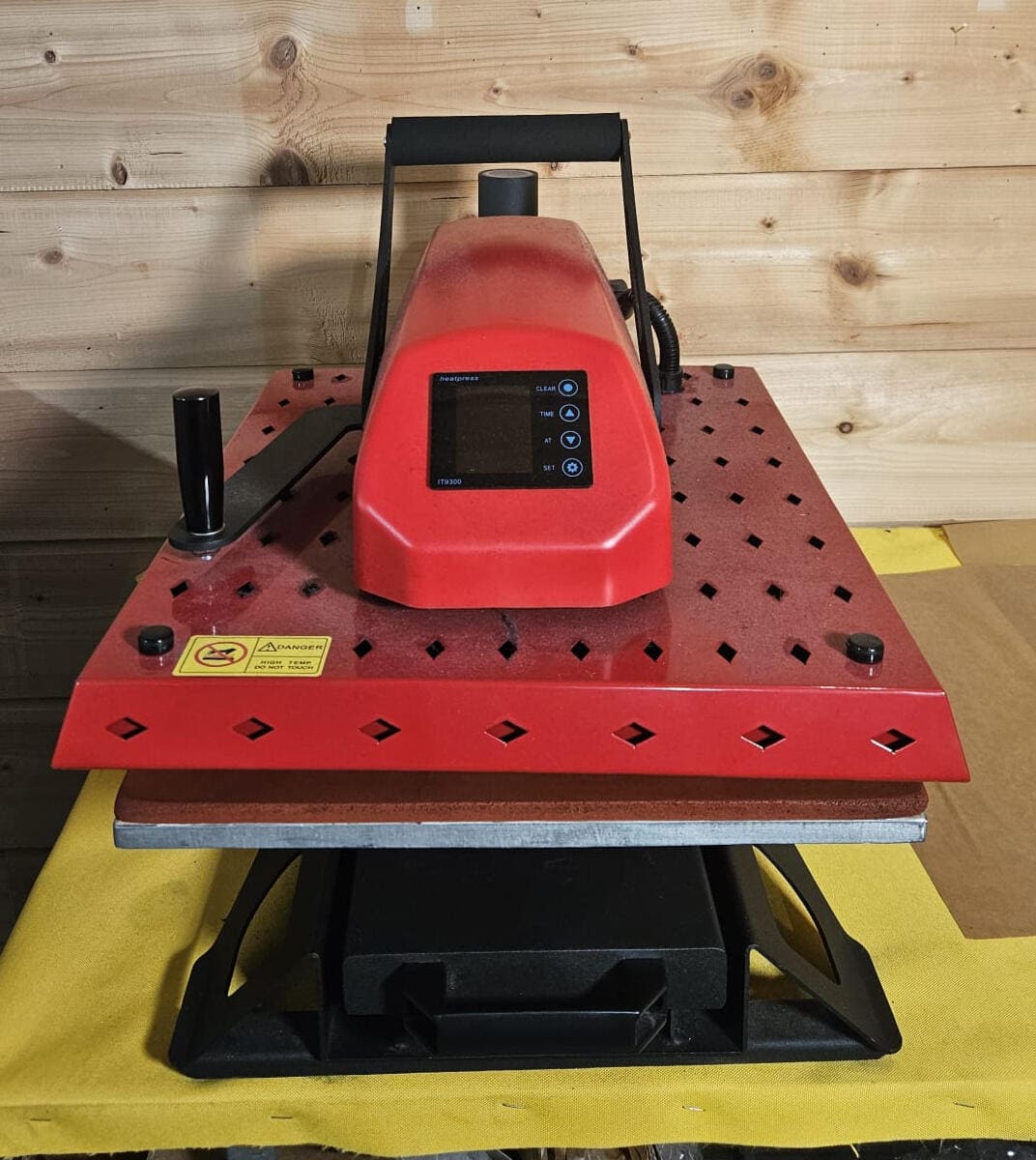 Presse à chaud rouge pour flocage et transferts textile